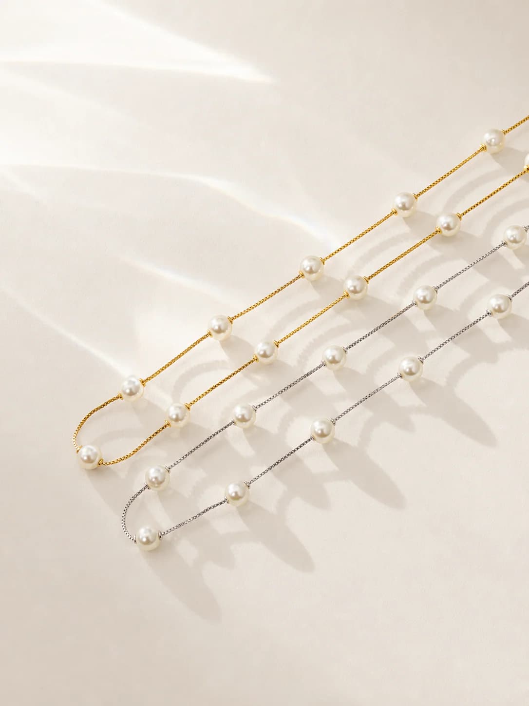 Pérolas 6mm 60cm dourado